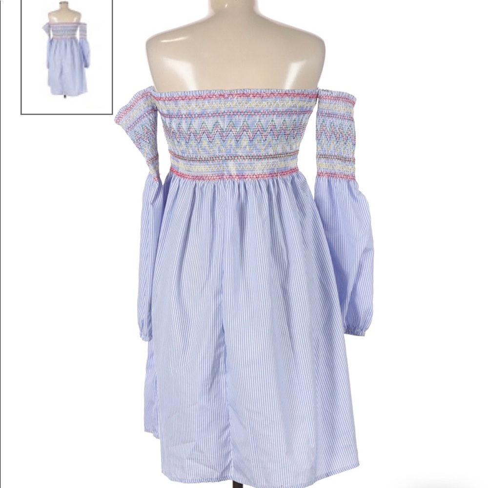 Super cute new without tags summer dress size medium fits more like a small.